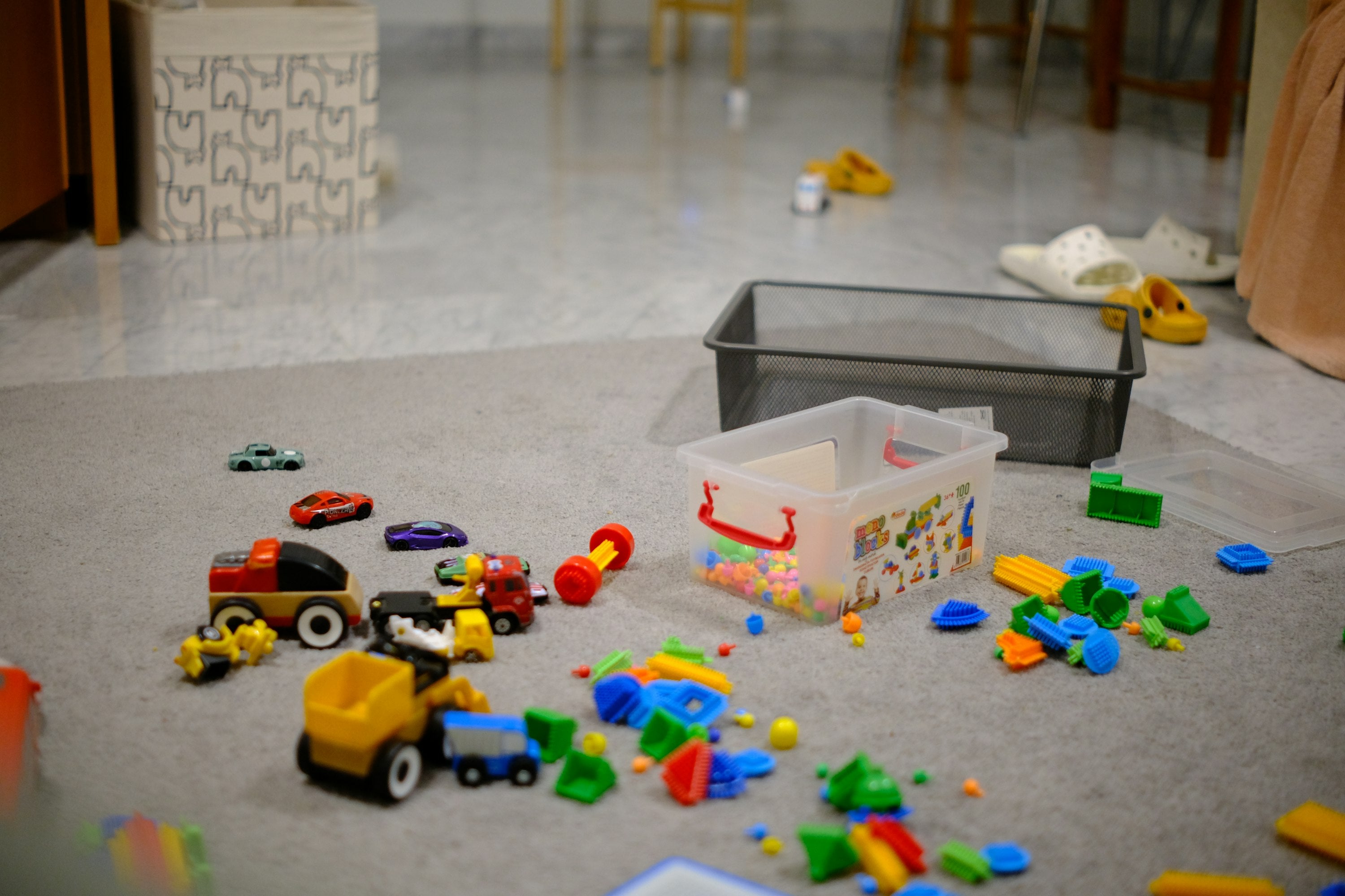Colorful toys scattered playfully, representing Toy Lune's bold and playful brand